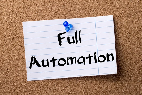 Full Automation - teared note paper pinned on bulletin board