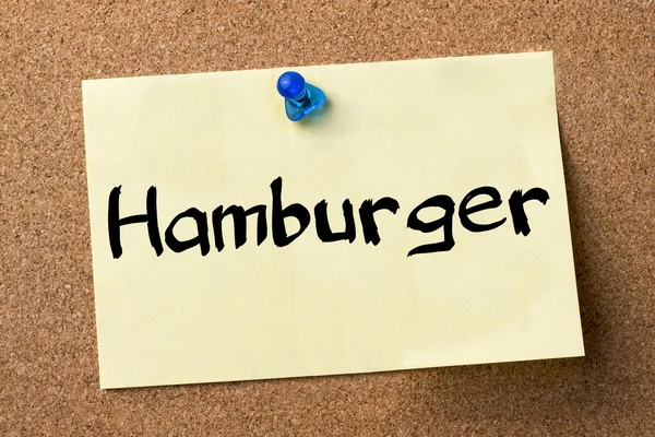 Hamburger - yapışkanlı etiket bulletin board tutturulmuş. — Stok fotoğraf