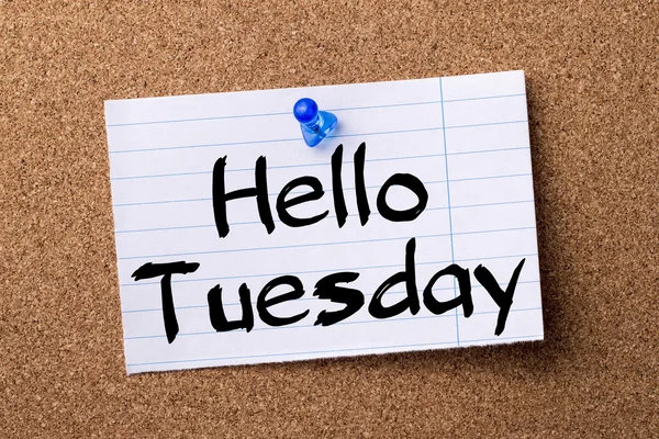 Hello Tuesday - teared note paper pinned on bulletin board — Stock Photo, Image