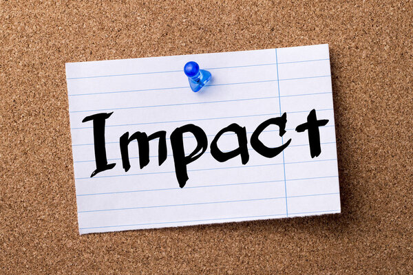 Impact - teared note paper pinned on bulletin board - horizontal image