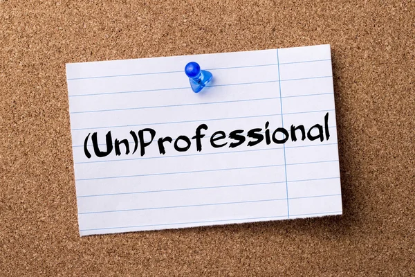 (Un)Professional - teared note paper pinned on bulletin board — Stock Photo, Image