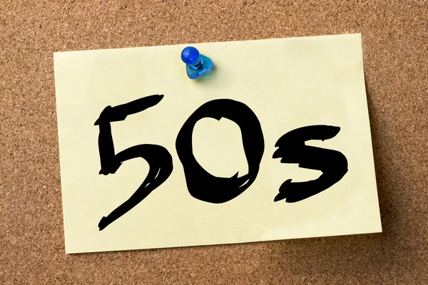 50s - etiket vastgemaakt op prikbord — Stockfoto