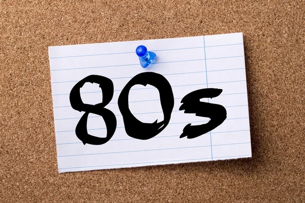 80s - teared note paper pinned on bulletin board — Stock Photo, Image