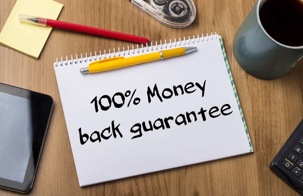 100% гарантия возврата денег - блокнот с текстом — стоковое фото