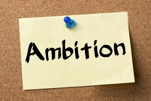 Ambition - adhesive label pinned on bulletin board — Stock Photo, Image