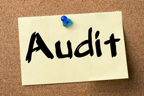 Audit - adhesive label pinned on bulletin board — Stock Photo, Image