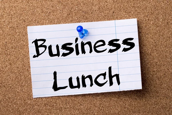 Business Lunch - teared note paper pinned on bulletin board