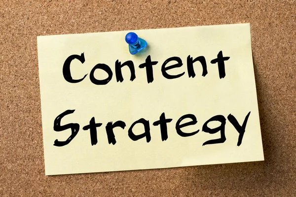 Content Strategy - adhesive label pinned on bulletin board — Stock Photo, Image