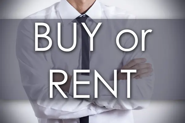 BUY atau RENT Pengusaha muda dengan teks konsep bisnis — Stok Foto