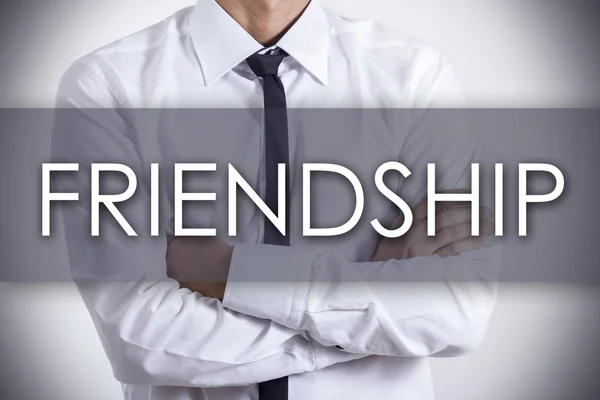 FRIENDSHIP - молодий бізнесмен з текстом - бізнес-концепція — стокове фото