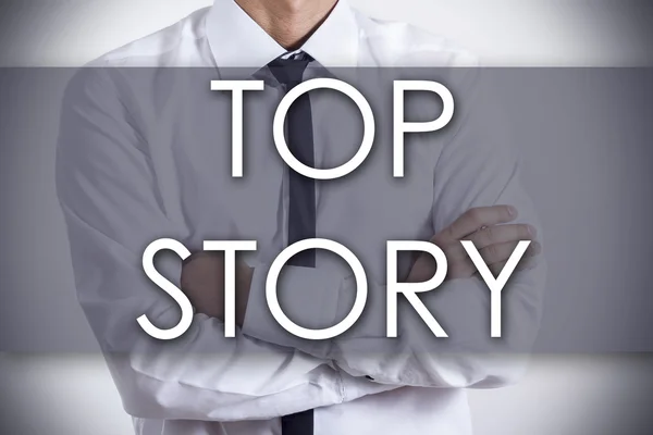 TOP STORY - Joven hombre de negocios con texto - concepto de negocio —  Fotos de Stock