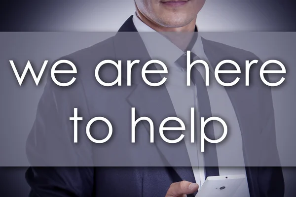 Vi är här för att hjälpa - ung affärsman med text - business con — Stockfoto