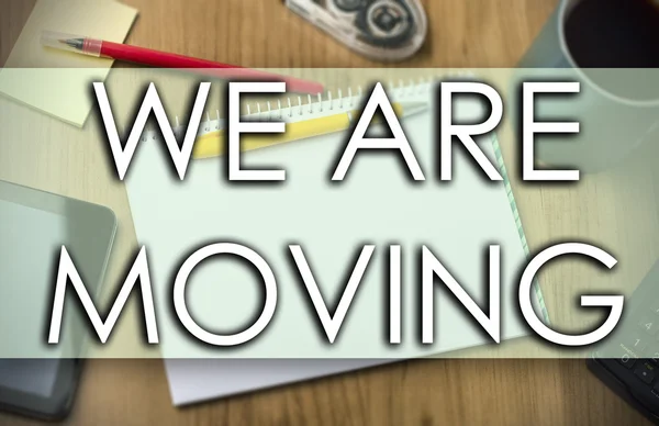 WE ARE MOVING -  business concept with text
