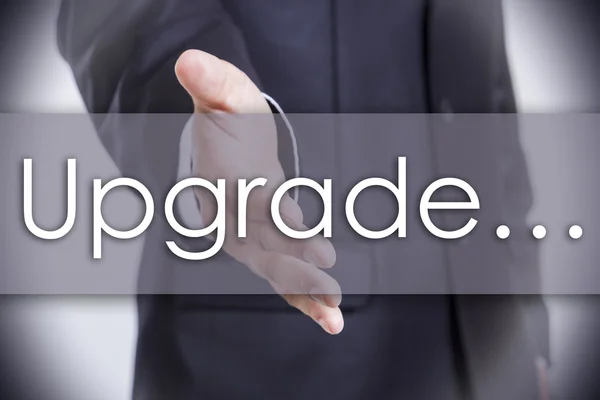 Upgrade... - concetto di business con testo — Foto Stock