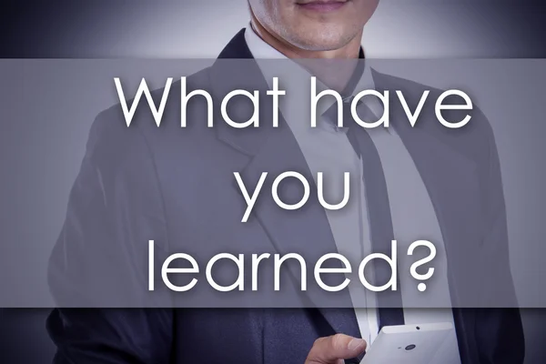 What have you learned? - Young businessman with text - business — Stock Fotó