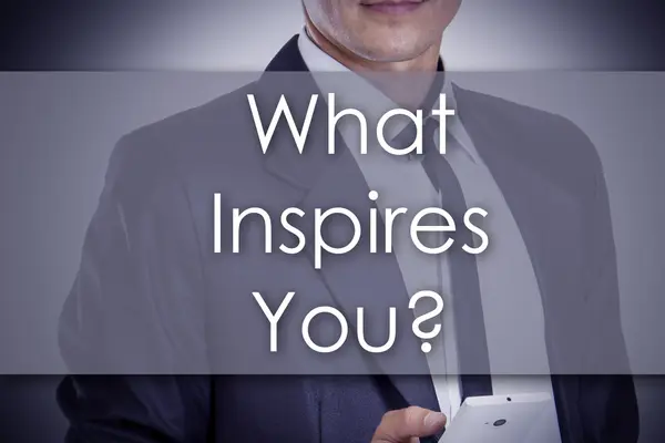 What Inspires You? - Young businessman with text - business conc — Stockfoto
