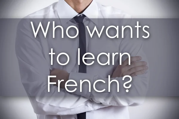 Quem quer aprender francês? - Jovem empresário com texto - busin — Fotografia de Stock