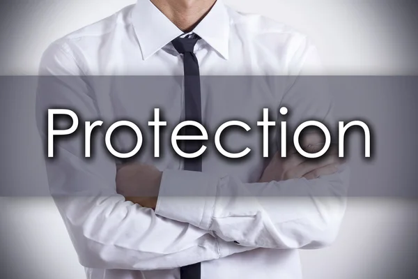 Protection - Young businessman with text - business concept — Stock Photo, Image