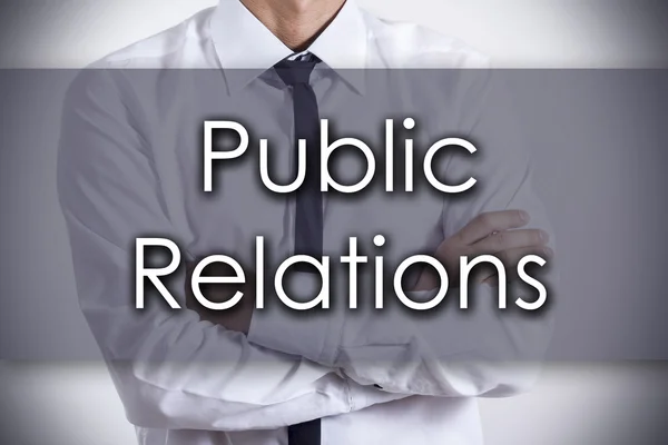 Public Relations - młody biznesmen z tekstem - biznes praktyczno — Zdjęcie stockowe