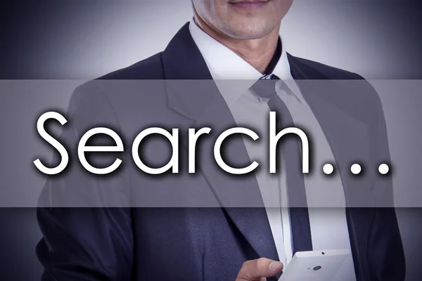 Search...- Young businessman with text - business concept — Stock Photo, Image