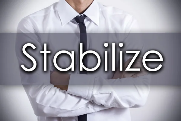 Stabilizálja - fiatal üzletember szöveggel - üzleti koncepció — Stock Fotó