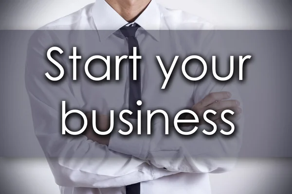 Розпочніть свій бізнес - молодий бізнесмен з текстом - business con — стокове фото