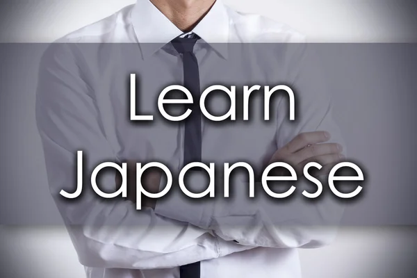 Japonca - metin ile genç işadamı - iş kavramı öğrenmek — Stok fotoğraf