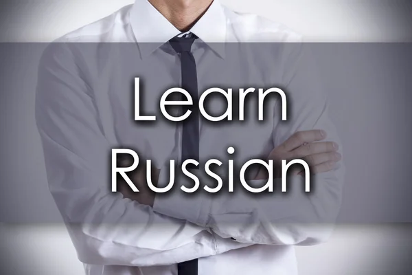 Aprender ruso - Joven hombre de negocios con texto - concepto de negocio —  Fotos de Stock