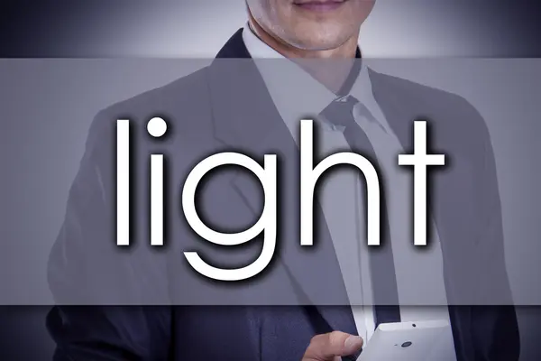 Światło - młody biznesmen z tekstem - koncepcja biznesowa — Zdjęcie stockowe