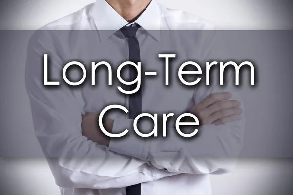 Long-Term Care - Young businessman with text - business concept