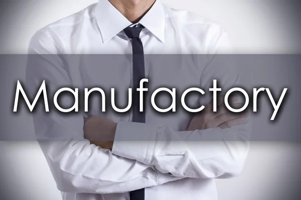 Manufactory - Young businessman with text - business concept — Stock Photo, Image