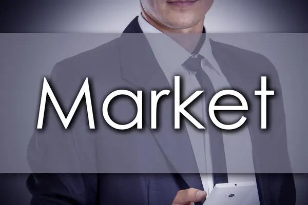 Рынок - Молодой бизнесмен с текстовой - бизнес-концепцией — стоковое фото