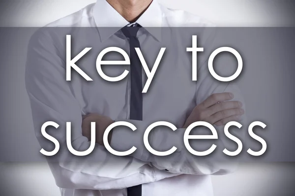 La chiave del successo - Giovane imprenditore con testo - concetto di business — Foto Stock
