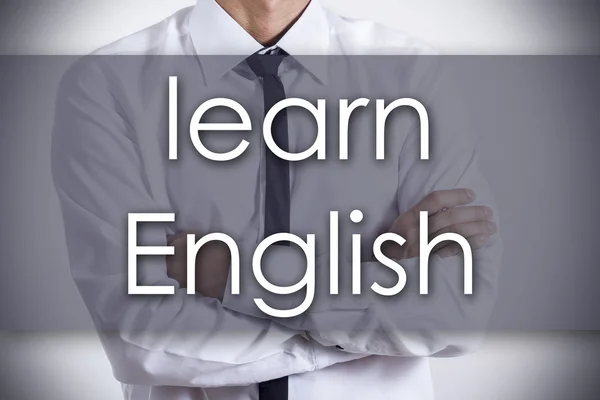 Английский язык - молодой бизнесмен с текстом - бизнес-концепция — стоковое фото