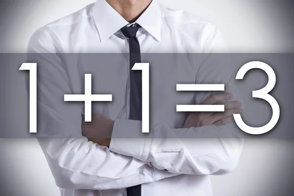 1 plus 1 equal 3 - plus one free  - Young businessman with text — Stock Photo, Image