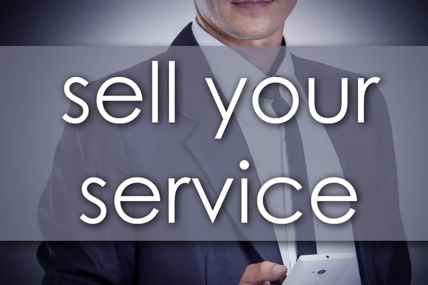 Sell your Service - Young businessman with text - business conce — Stock Photo, Image