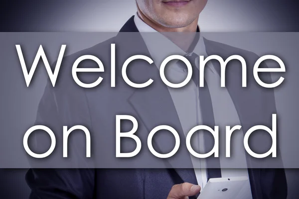 Welcome on Board - Young businessman with text - business concep