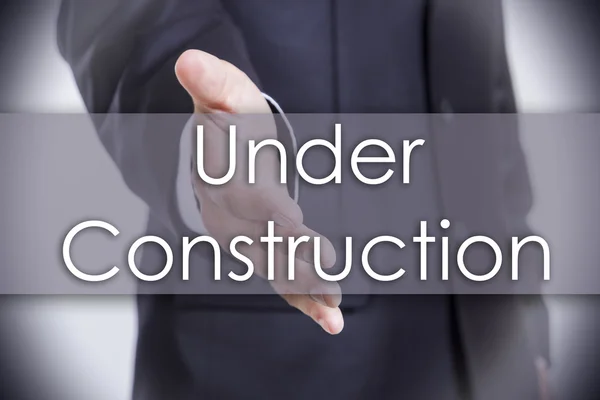 Under Construction - бизнес концепция с текстом — стоковое фото