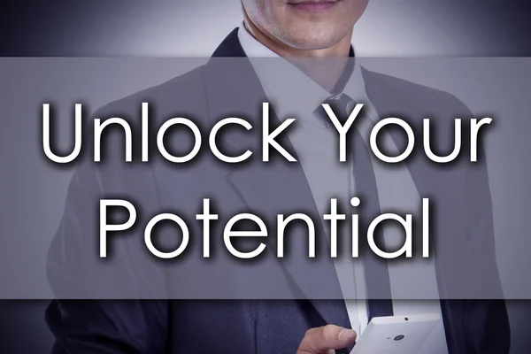 Desbloquear o seu potencial - Jovem empresário com texto - negócio c — Fotografia de Stock