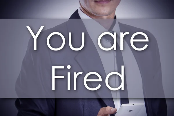 Você está demitido - Jovem empresário com texto - conceito de negócio — Fotografia de Stock