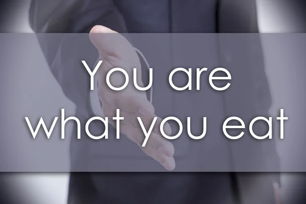 Je bent wat je eet - bedrijfsconcept met tekst — Stockfoto