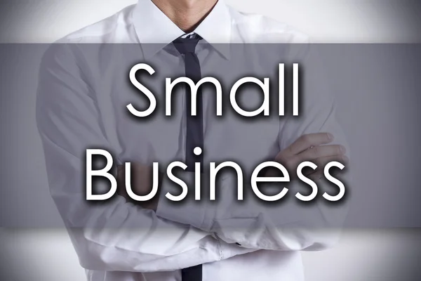 Малий бізнес - молодий бізнесмен з текстом - бізнес-концепція — стокове фото