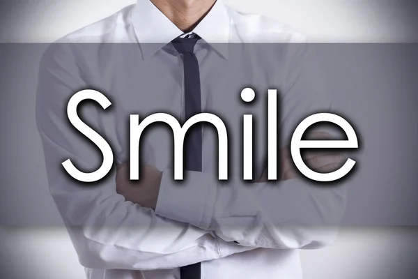 Koncepcja biznesowa uśmiech - młody biznesmen z tekstem- — Zdjęcie stockowe