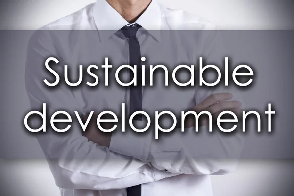 Sustainable development - Young businessman with text - business — Stock Photo, Image