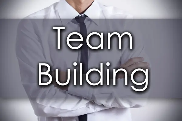 Team Building - молодий бізнесмен з текстом - бізнес-концепція — стокове фото