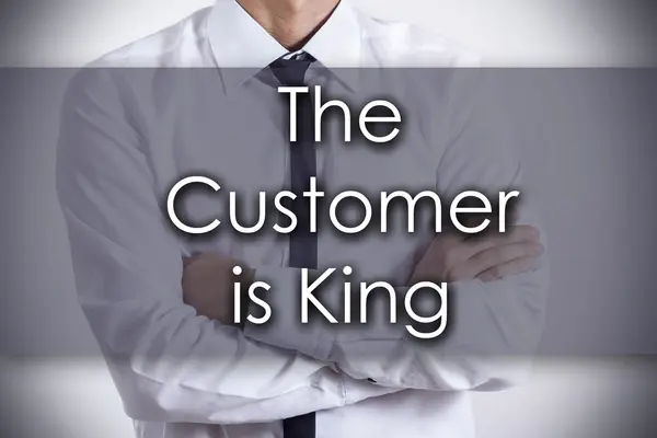 De klant is koning - jonge zakenman met tekst - business co — Stockfoto