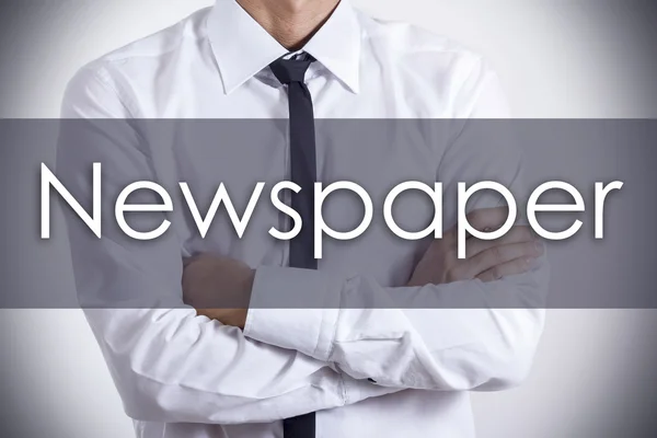 Newspaper - Young businessman with text - business concept — Stock Photo, Image