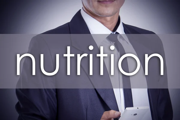 Nutrition - Jeune homme d'affaires avec texte - concept d'entreprise — Photo