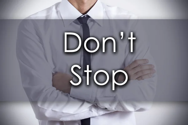 Don't Stop - Jeune homme d'affaires avec texte - concept d'entreprise — Photo