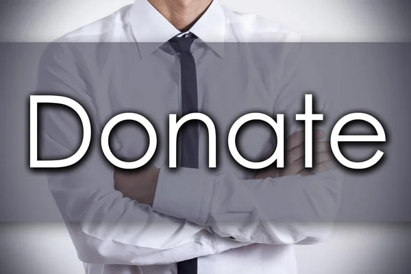 DONATE - Jeune homme d'affaires avec texte - concept d'entreprise — Photo